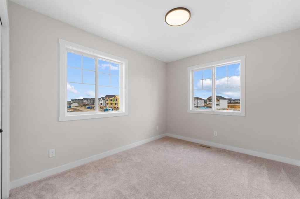 MLS&reg; # A2268325 - 68 Buffaloberry Manor SE in Ricardo Ranch Calgary, Residential Open Houses