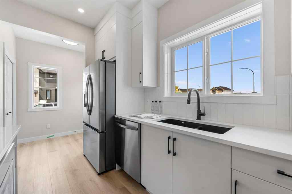 MLS&reg; # A2268325 - 68 Buffaloberry Manor SE in Ricardo Ranch Calgary, Residential Open Houses