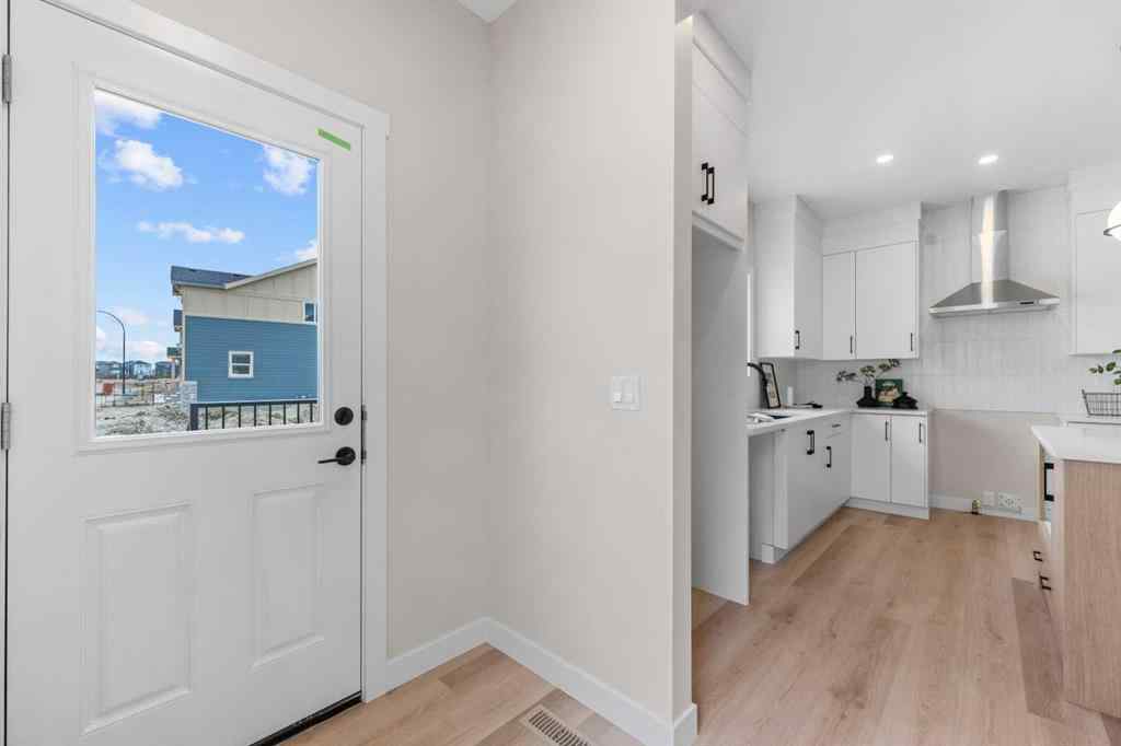 MLS&reg; # A2268325 - 68 Buffaloberry Manor SE in Ricardo Ranch Calgary, Residential Open Houses