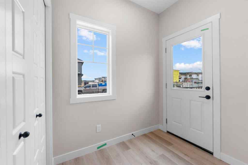 MLS&reg; # A2268325 - 68 Buffaloberry Manor SE in Ricardo Ranch Calgary, Residential Open Houses