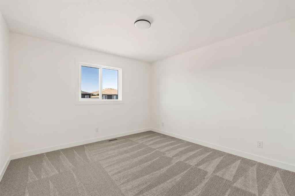 MLS® A2268326 - 168 Creekstone Circle SW in Pine Creek Calgary, Residential