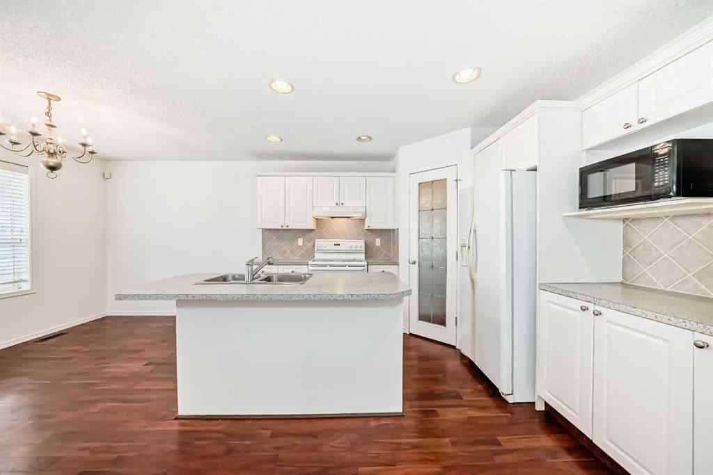 MLS® A2268327 - 8 Cranfield Place SE in Cranston Calgary, Residential