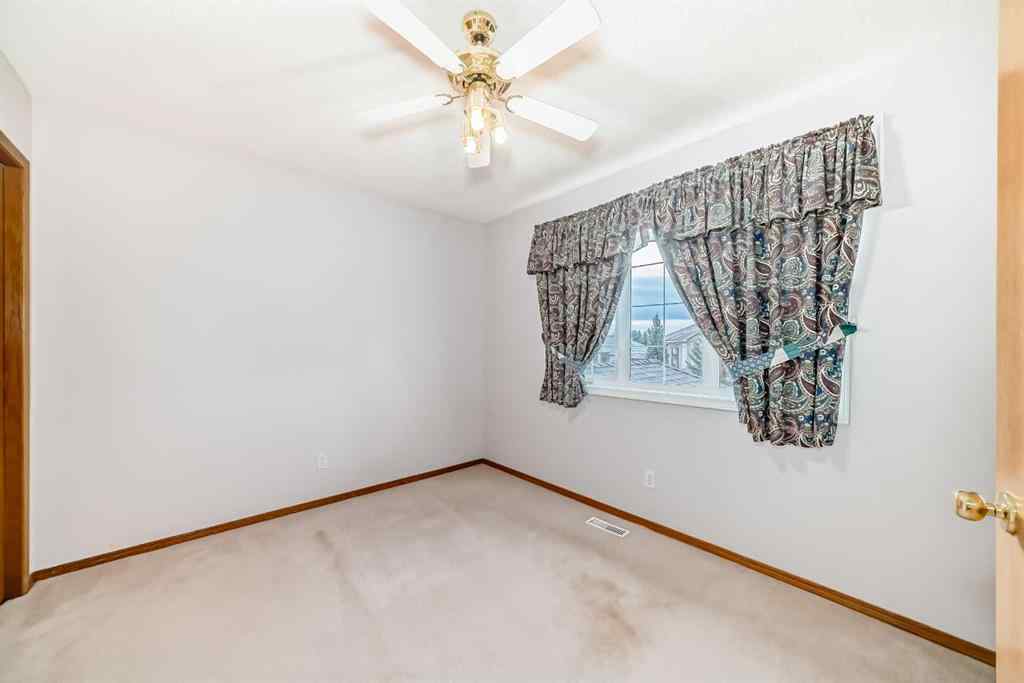 MLS® A2268328 - 120 COVE Road  in The Cove Chestermere, Residential