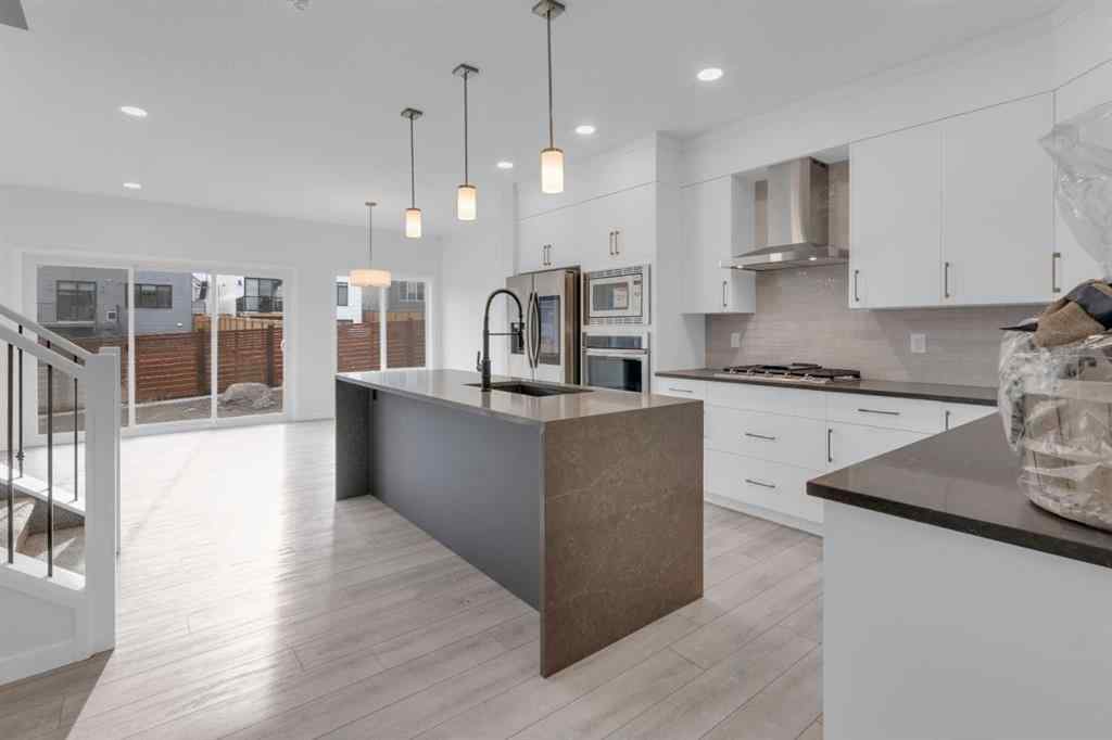 MLS® A2268350 - 303 Calhoun Crescent NE in Livingston Calgary, Residential