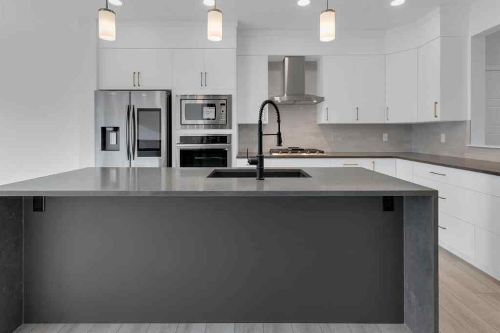 MLS® A2268350 - 303 Calhoun Crescent NE in Livingston Calgary, Residential