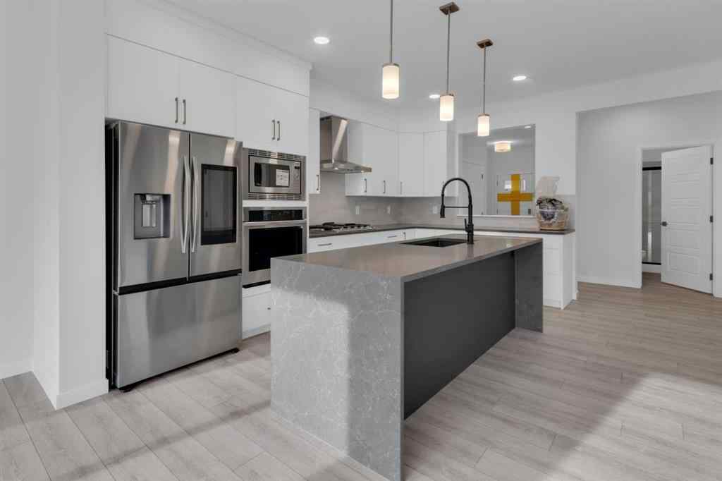 MLS® A2268350 - 303 Calhoun Crescent NE in Livingston Calgary, Residential