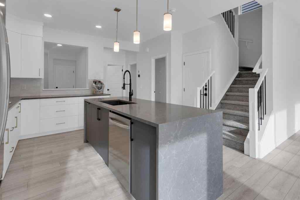 MLS® A2268350 - 303 Calhoun Crescent NE in Livingston Calgary, Residential