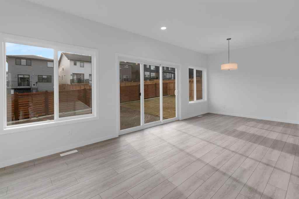 MLS® A2268350 - 303 Calhoun Crescent NE in Livingston Calgary, Residential