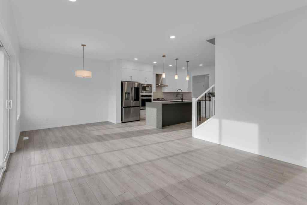 MLS® A2268350 - 303 Calhoun Crescent NE in Livingston Calgary, Residential