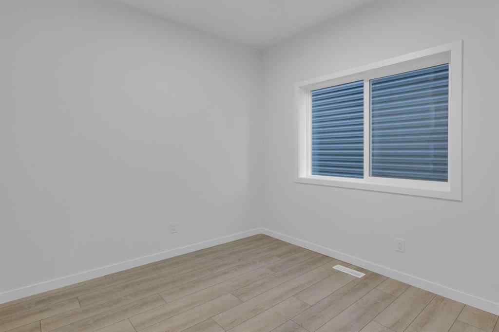 MLS® A2268350 - 303 Calhoun Crescent NE in Livingston Calgary, Residential