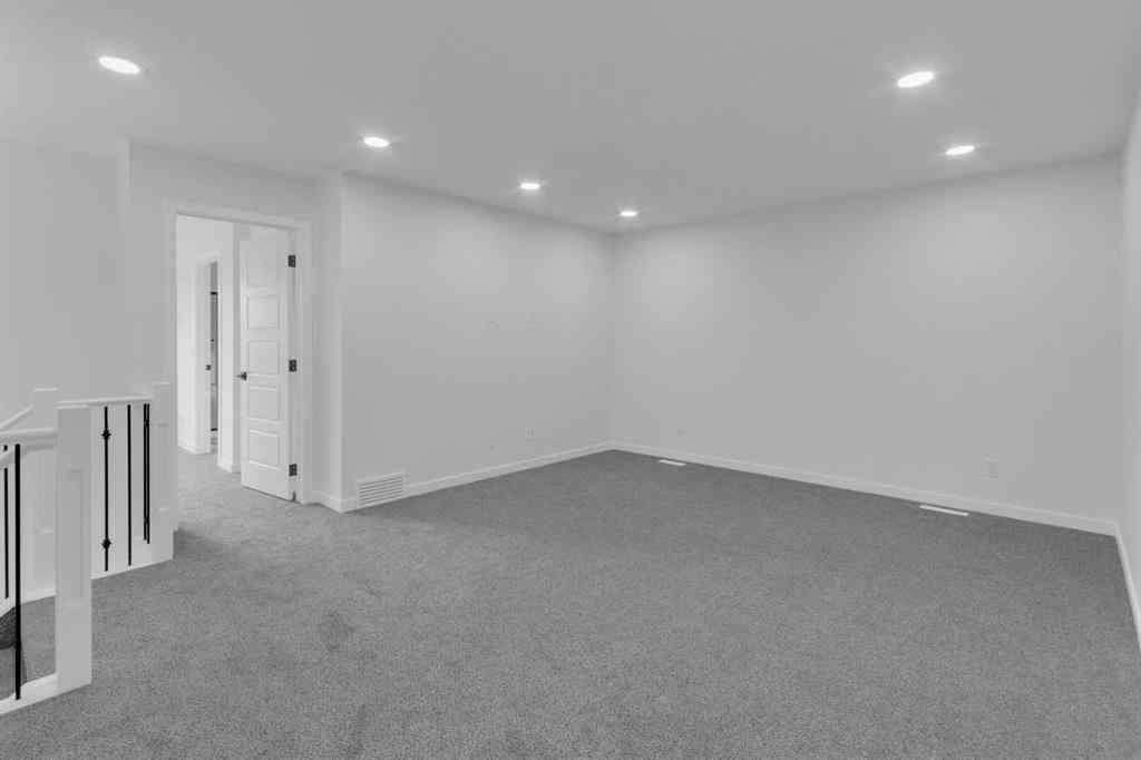 MLS® A2268350 - 303 Calhoun Crescent NE in Livingston Calgary, Residential