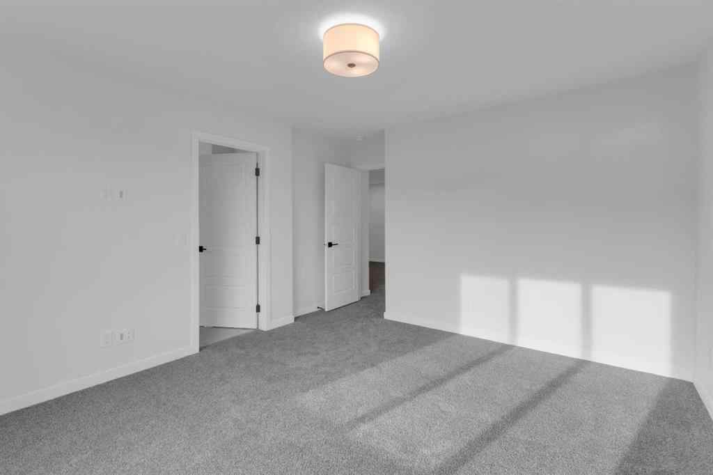 MLS® A2268350 - 303 Calhoun Crescent NE in Livingston Calgary, Residential