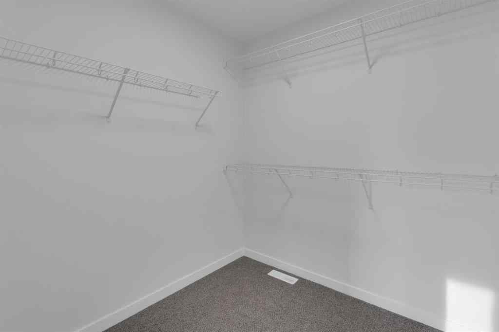 MLS® A2268350 - 303 Calhoun Crescent NE in Livingston Calgary, Residential