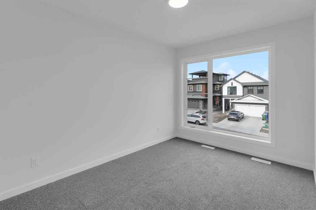 MLS® A2268350 - 303 Calhoun Crescent NE in Livingston Calgary, Residential