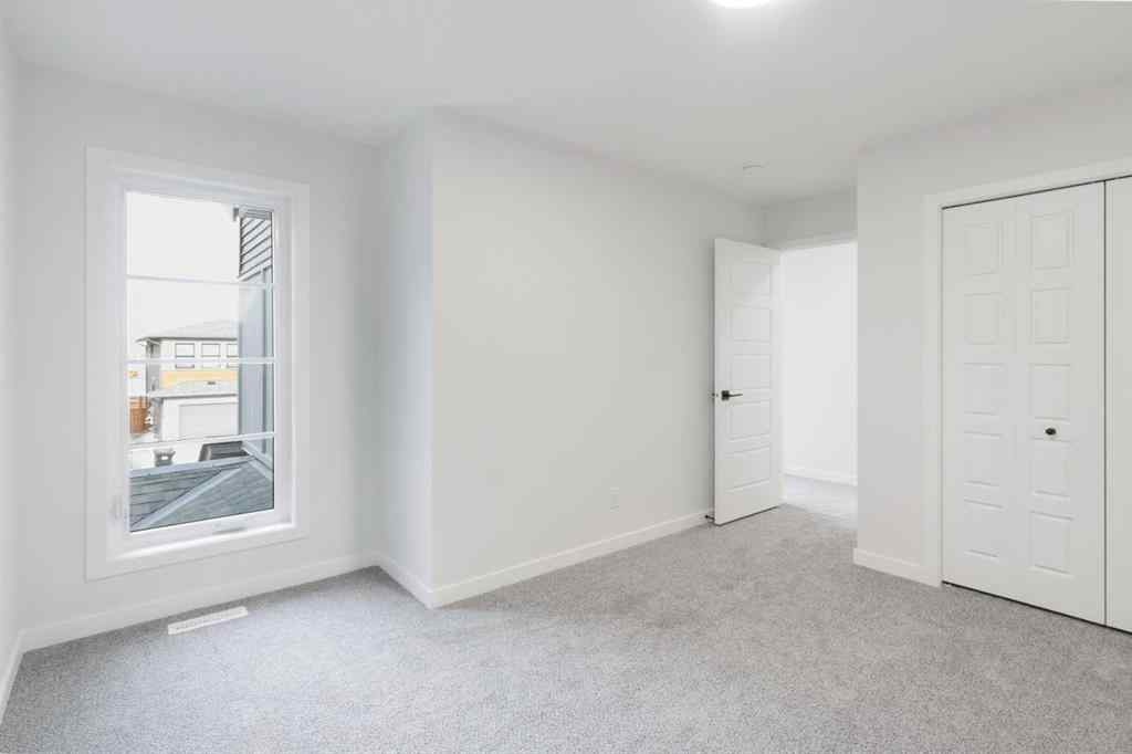 MLS® A2268350 - 303 Calhoun Crescent NE in Livingston Calgary, Residential