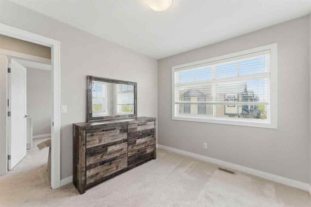 MLS® A2268379 - 815 85 Street SW in West Springs Calgary, Residential