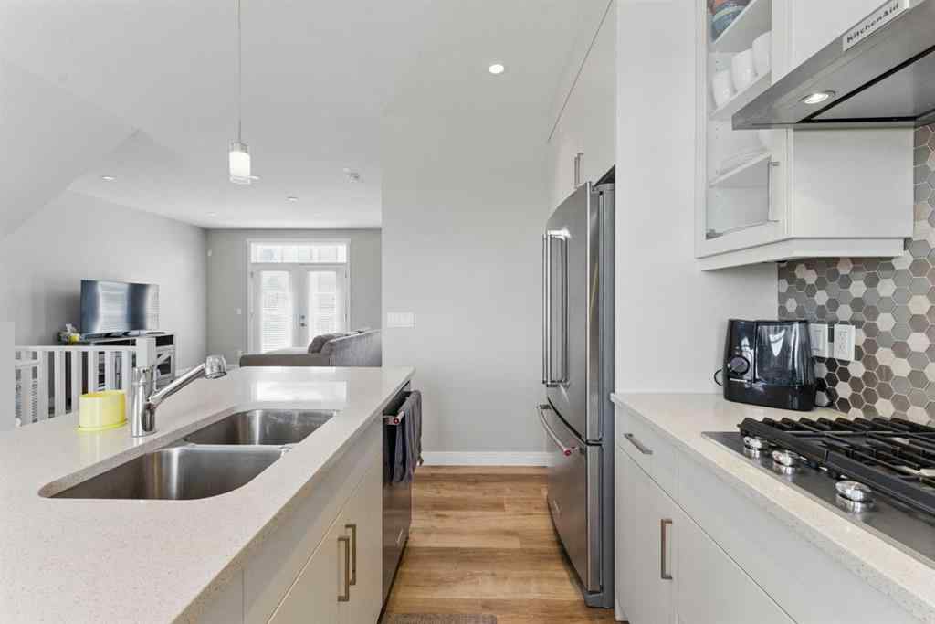 MLS® A2268379 - 815 85 Street SW in West Springs Calgary, Residential