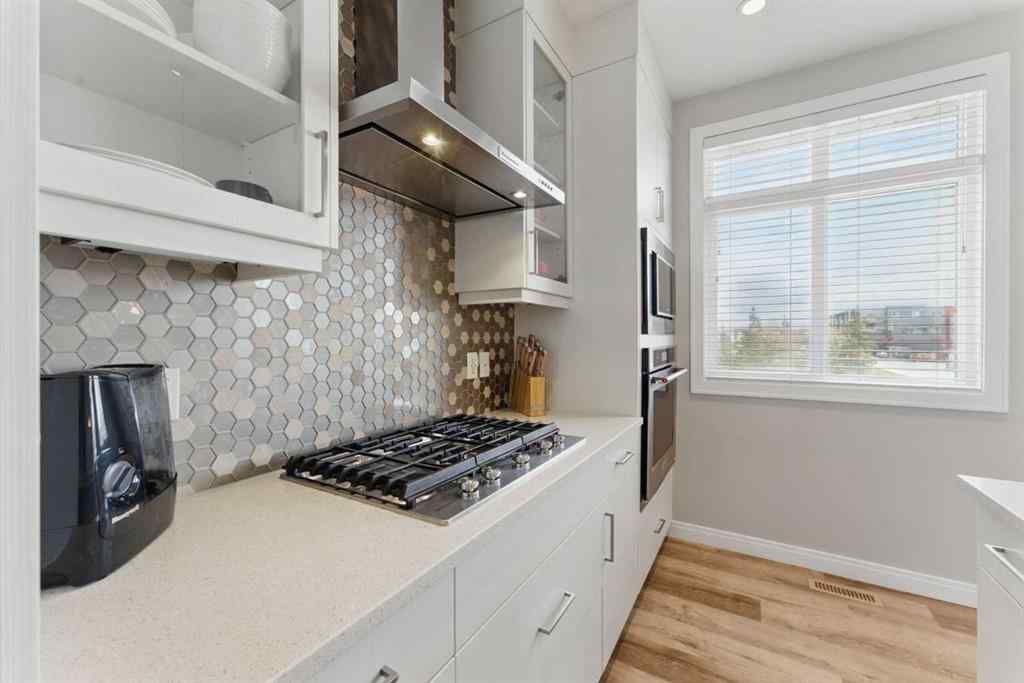 MLS® A2268379 - 815 85 Street SW in West Springs Calgary, Residential