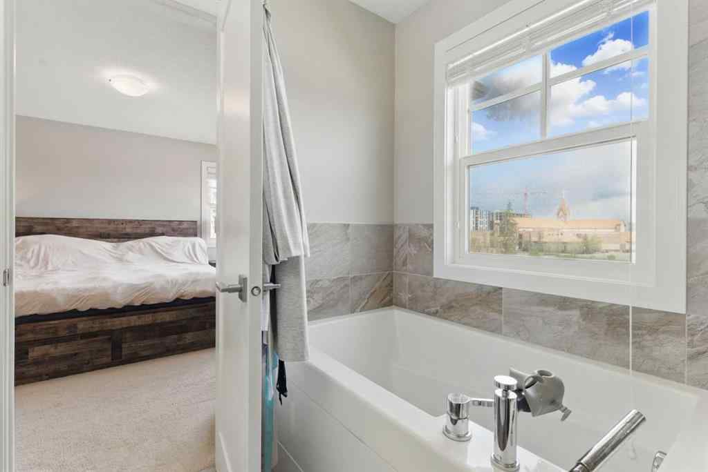 MLS® A2268379 - 815 85 Street SW in West Springs Calgary, Residential