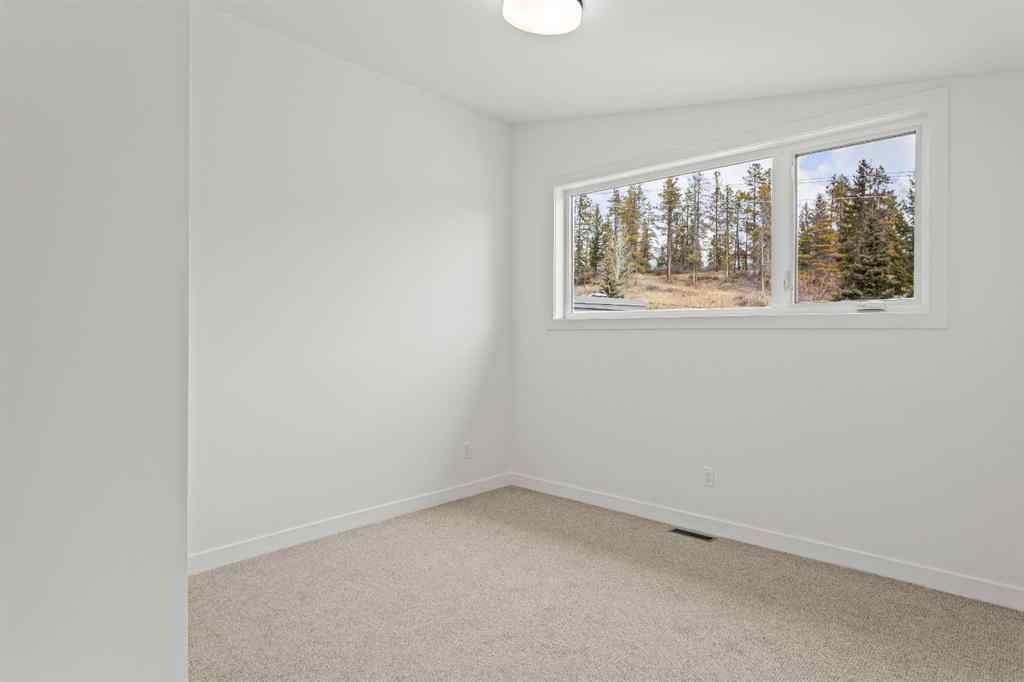 MLS® A2268386 - 249A Three Sisters Drive  in Hospital Hill Canmore, Residential