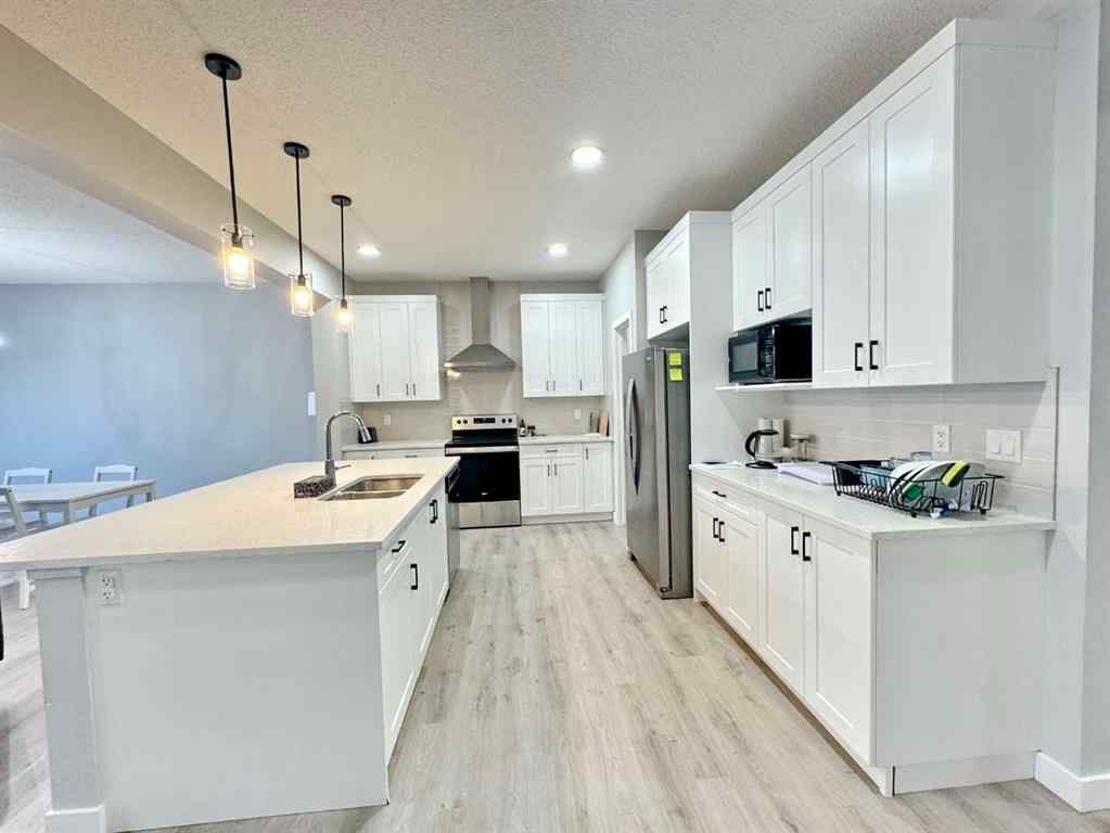 MLS® A2268387 - 14 sundown Close  in Sunset Ridge Cochrane, Residential