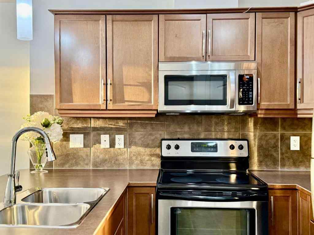 MLS® A2268388 - Unit #220 15304 Bannister Road SE in Midnapore Calgary, Residential