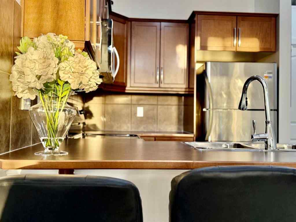 MLS® A2268388 - Unit #220 15304 Bannister Road SE in Midnapore Calgary, Residential