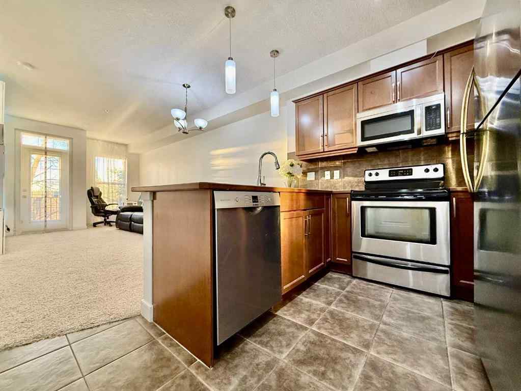 MLS® A2268388 - Unit #220 15304 Bannister Road SE in Midnapore Calgary, Residential