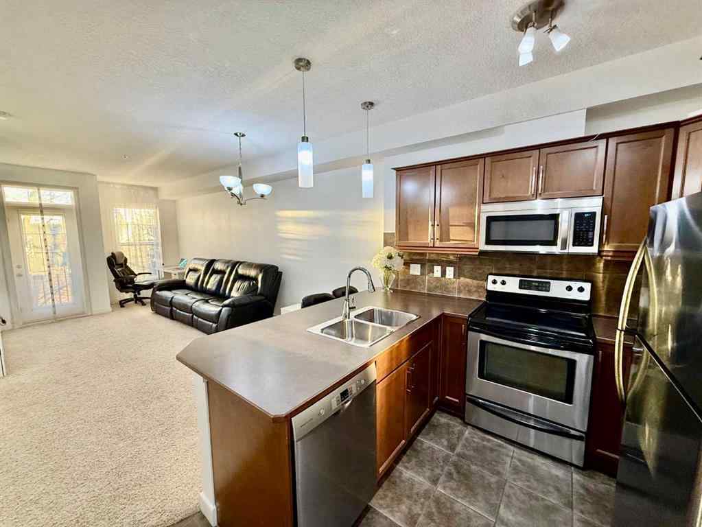 MLS® A2268388 - Unit #220 15304 Bannister Road SE in Midnapore Calgary, Residential