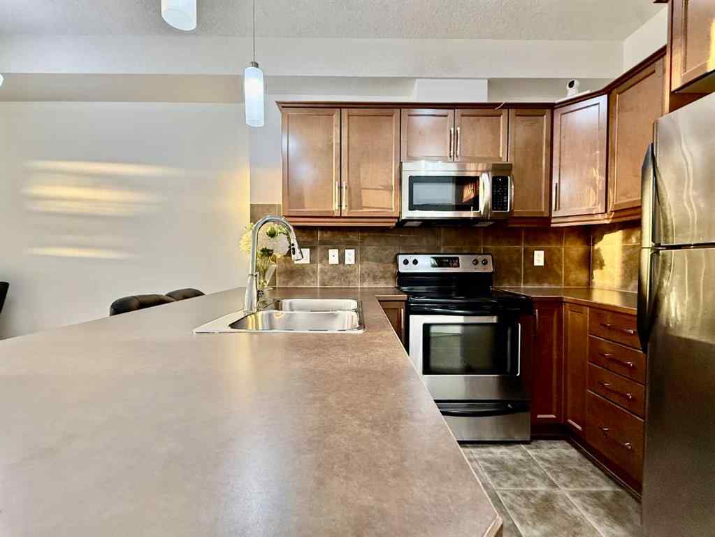 MLS® A2268388 - Unit #220 15304 Bannister Road SE in Midnapore Calgary, Residential