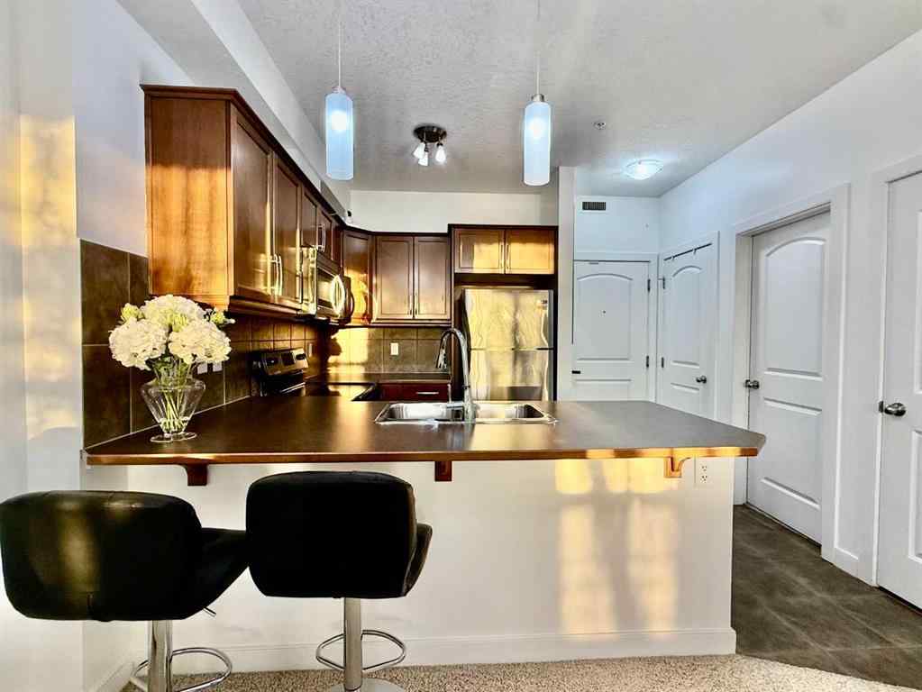 MLS® A2268388 - Unit #220 15304 Bannister Road SE in Midnapore Calgary, Residential