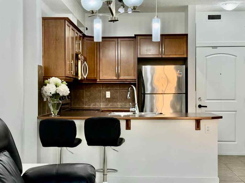 MLS® A2268388 - Unit #220 15304 Bannister Road SE in Midnapore Calgary, Residential