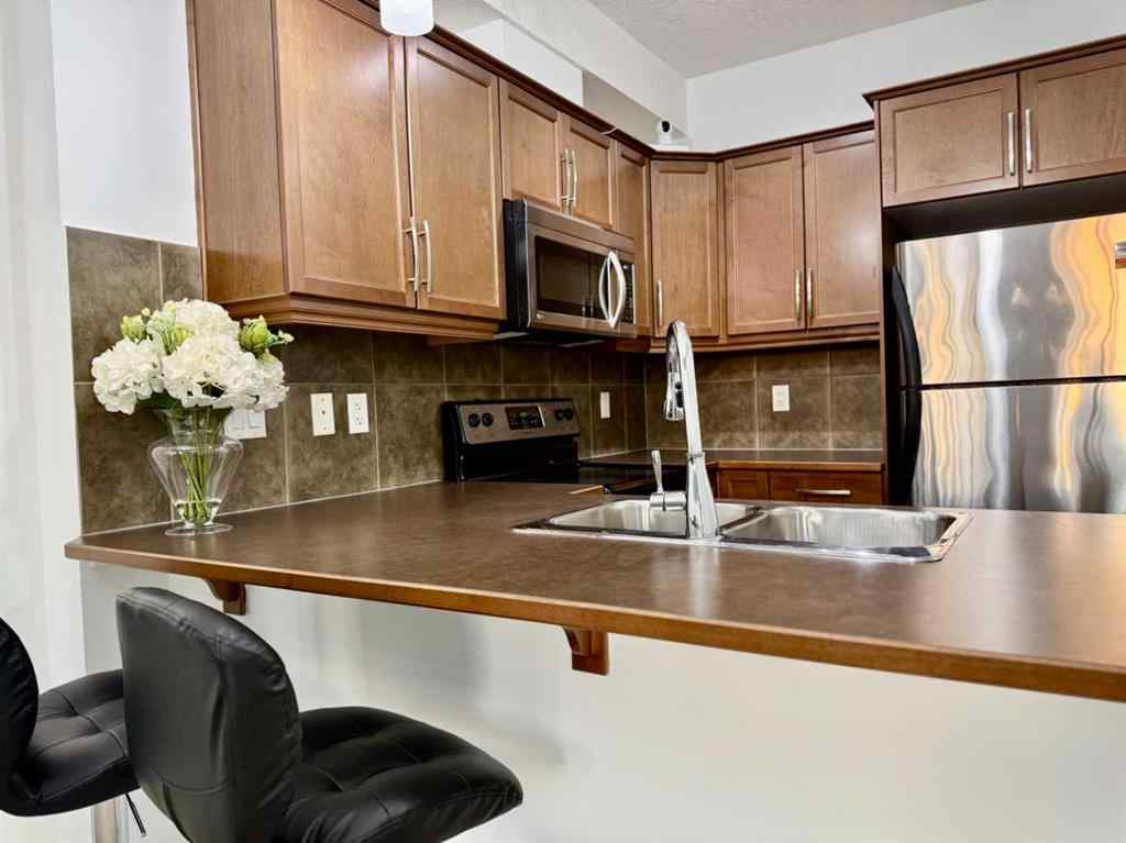 MLS® A2268388 - Unit #220 15304 Bannister Road SE in Midnapore Calgary, Residential