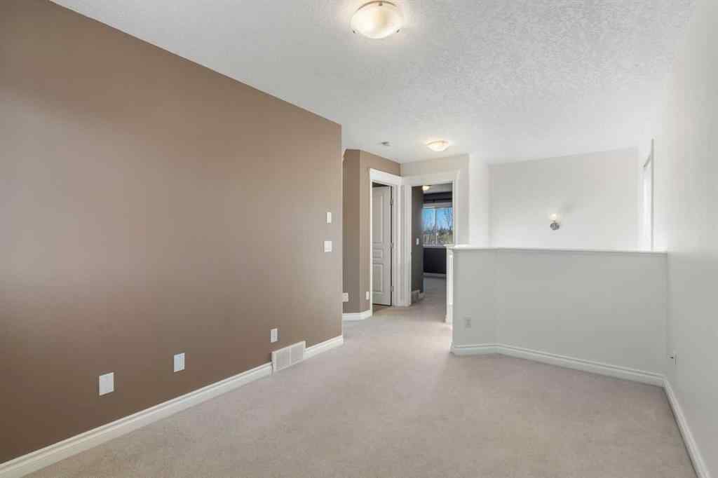 MLS® A2268390 - 84 Crystal Shores Cove  in Crystal Shores Okotoks, Residential