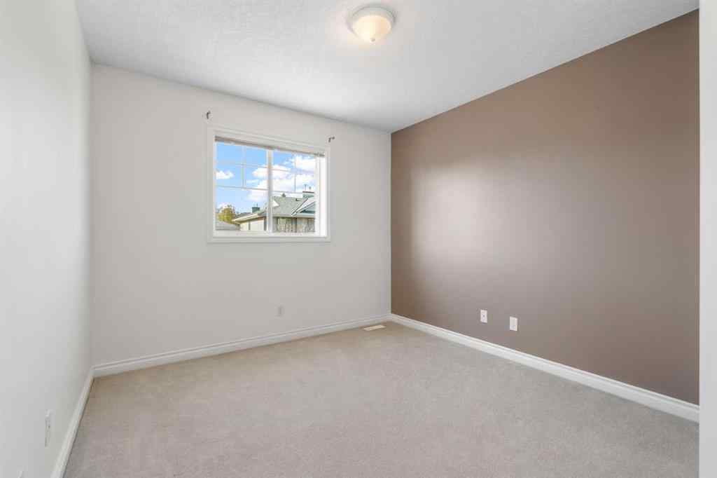 MLS® A2268390 - 84 Crystal Shores Cove  in Crystal Shores Okotoks, Residential