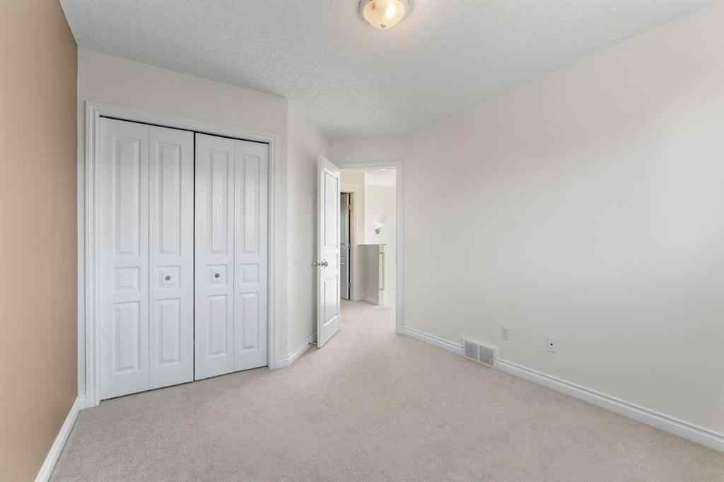 MLS® A2268390 - 84 Crystal Shores Cove  in Crystal Shores Okotoks, Residential