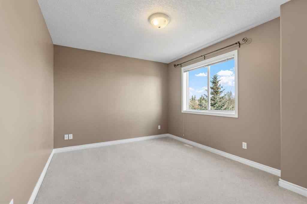 MLS® A2268390 - 84 Crystal Shores Cove  in Crystal Shores Okotoks, Residential