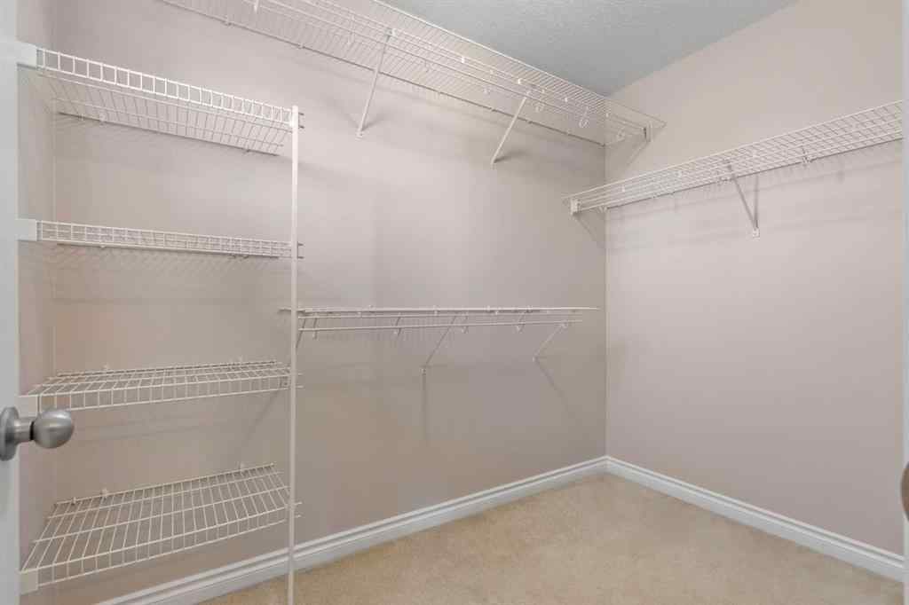 MLS® A2268390 - 84 Crystal Shores Cove  in Crystal Shores Okotoks, Residential