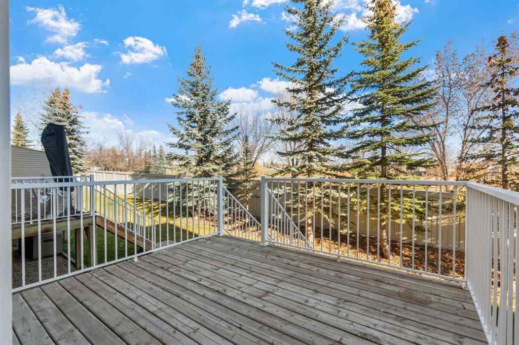 MLS® A2268390 - 84 Crystal Shores Cove  in Crystal Shores Okotoks, Residential