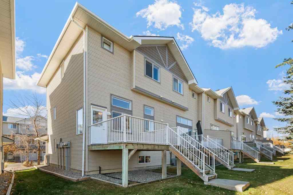 MLS® A2268390 - 84 Crystal Shores Cove  in Crystal Shores Okotoks, Residential