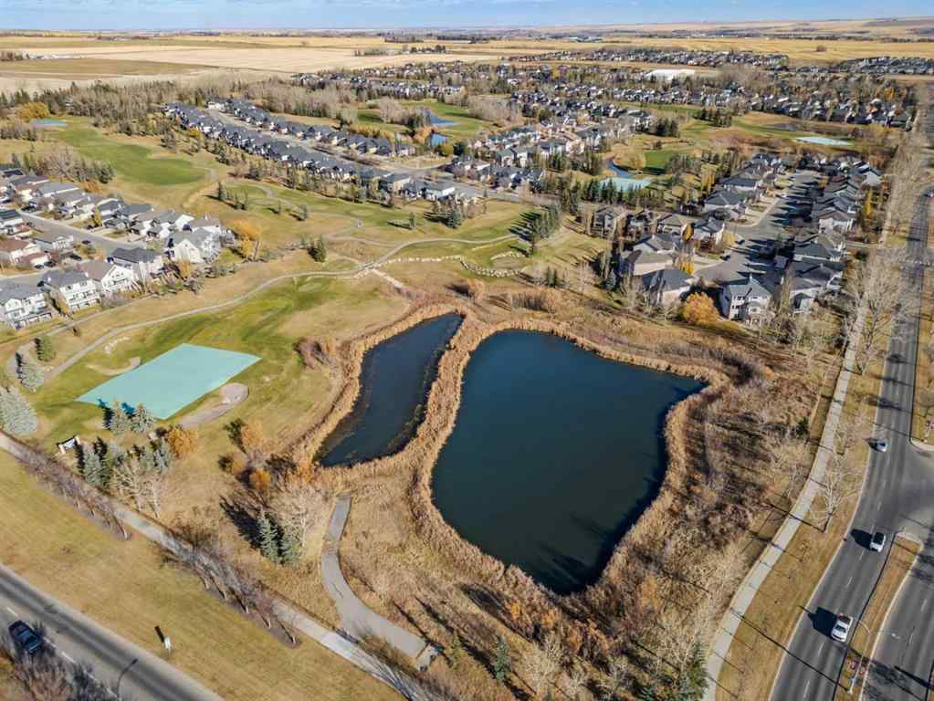 MLS® A2268390 - 84 Crystal Shores Cove  in Crystal Shores Okotoks, Residential