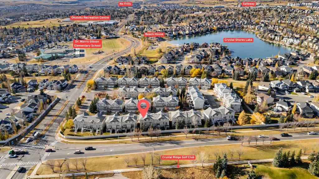 MLS® A2268390 - 84 Crystal Shores Cove  in Crystal Shores Okotoks, Residential