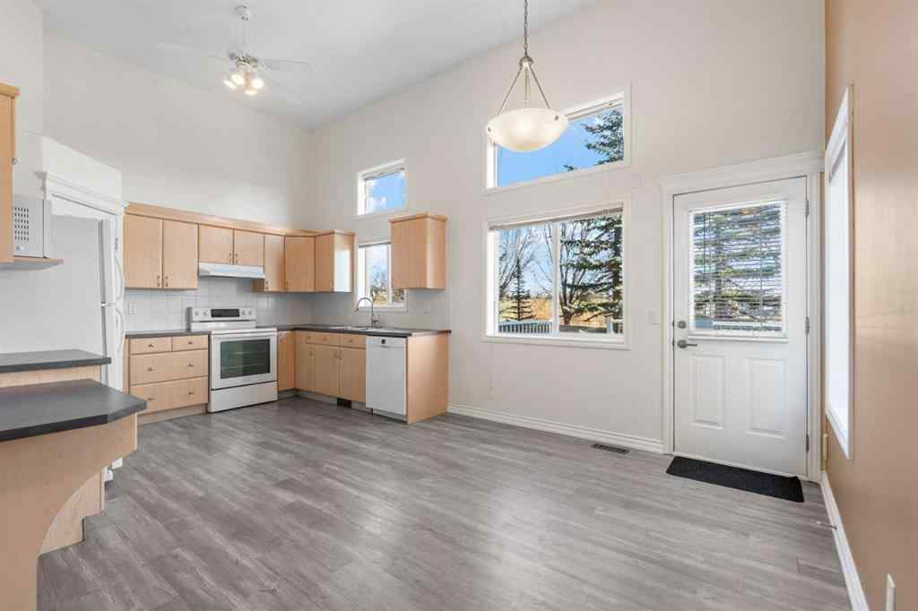 MLS® A2268390 - 84 Crystal Shores Cove  in Crystal Shores Okotoks, Residential
