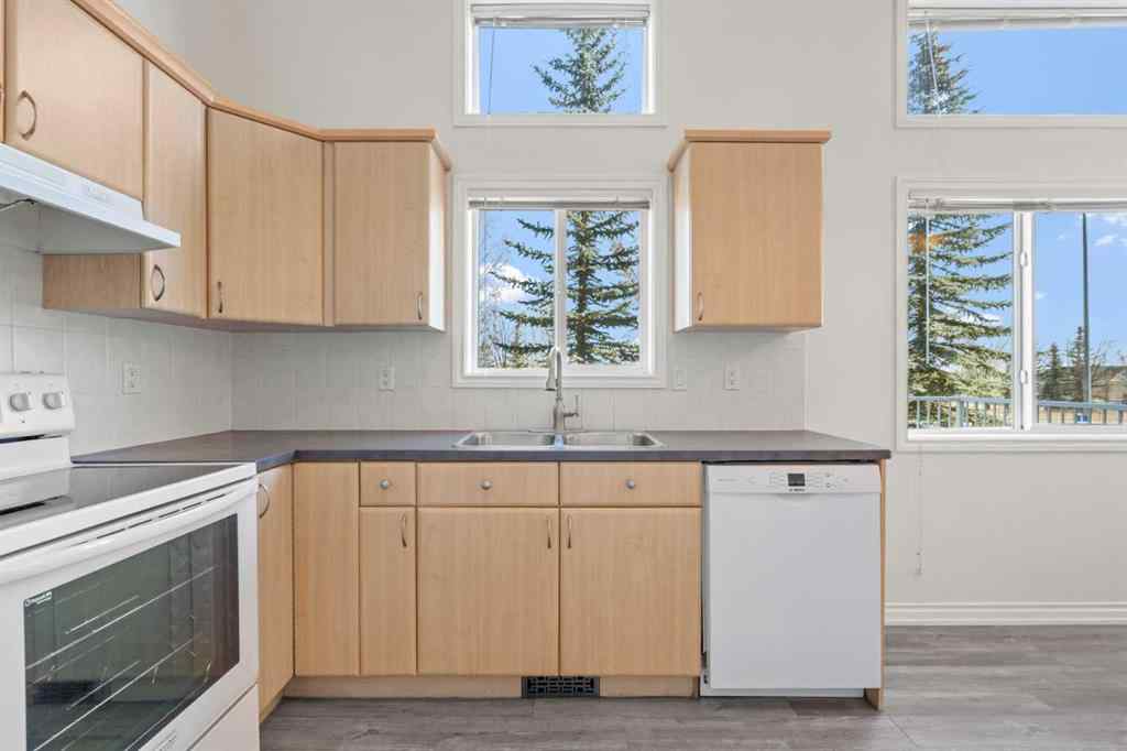 MLS® A2268390 - 84 Crystal Shores Cove  in Crystal Shores Okotoks, Residential