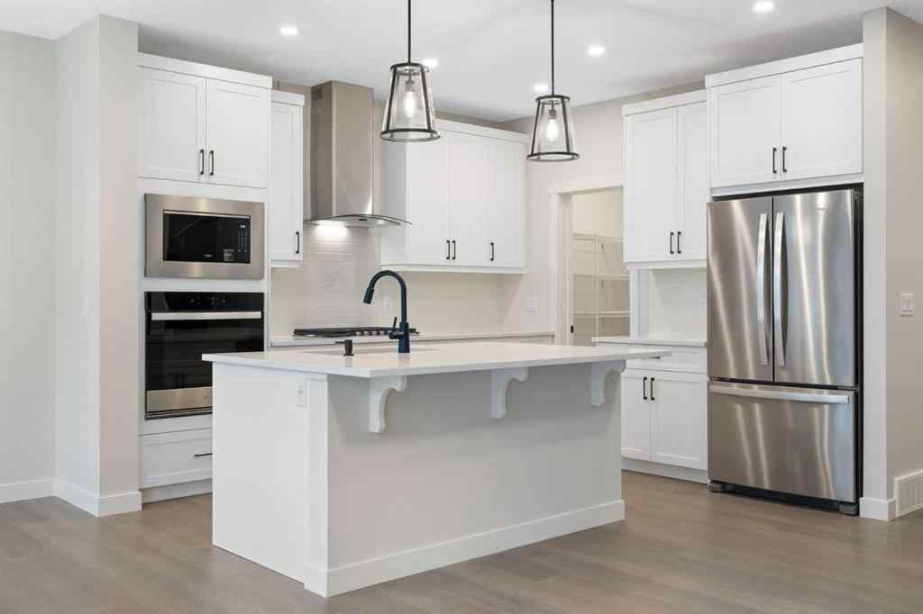 MLS® A2268427 - 338 Rivercrest Road  in Rivercrest Cochrane, Residential