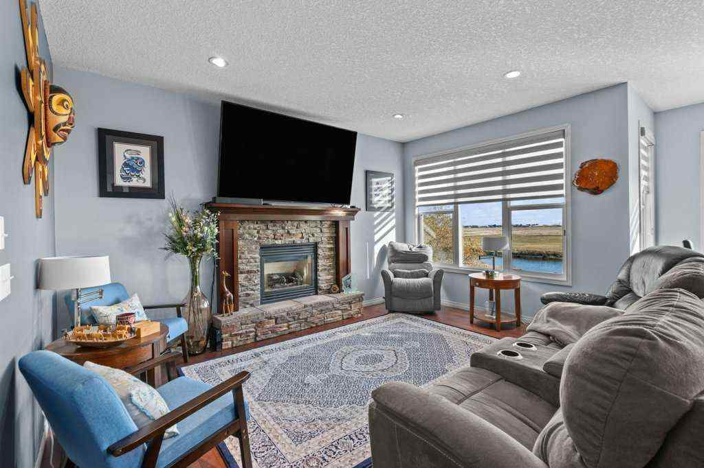 MLS® A2268451 - 61 Boulder Creek Manor SE in Boulder Creek Estates Langdon, Residential