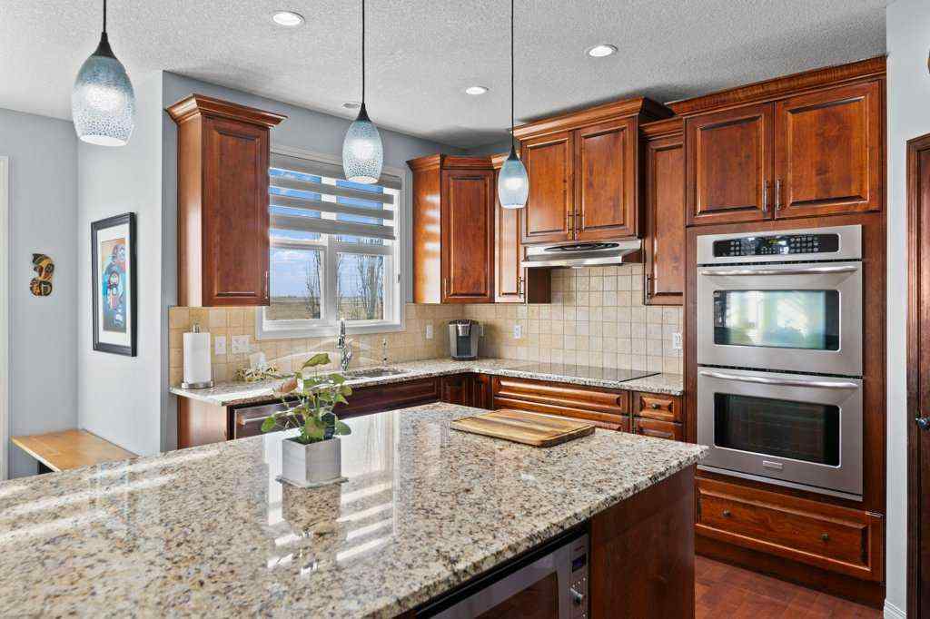 MLS® A2268451 - 61 Boulder Creek Manor SE in Boulder Creek Estates Langdon, Residential