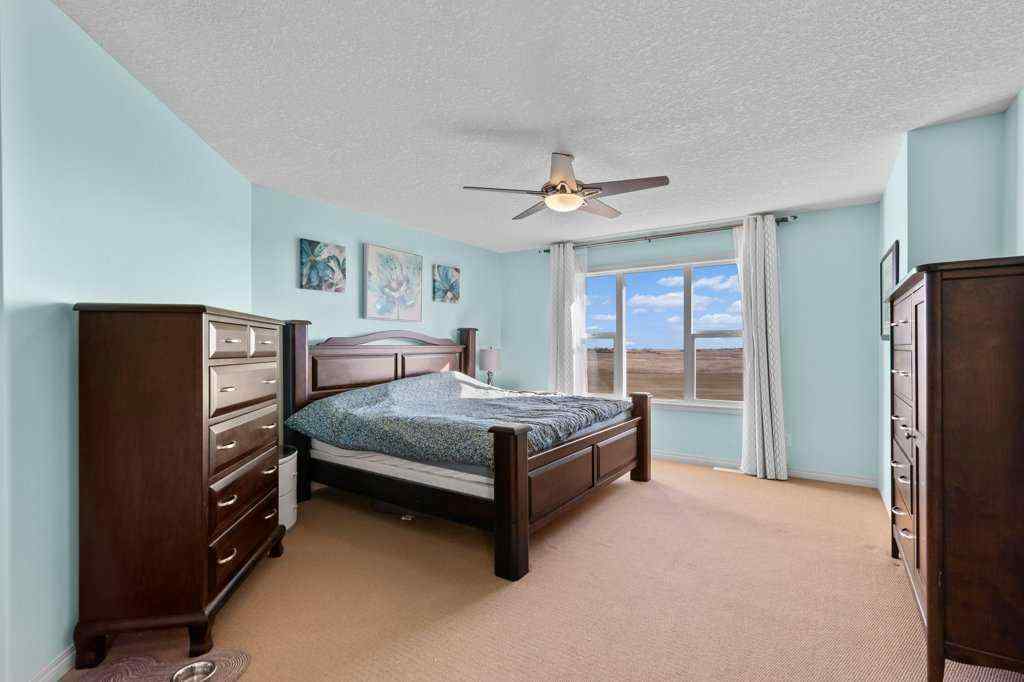 MLS® A2268451 - 61 Boulder Creek Manor SE in Boulder Creek Estates Langdon, Residential