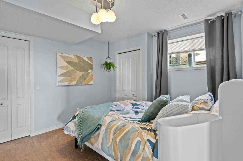 MLS® A2268451 - 61 Boulder Creek Manor SE in Boulder Creek Estates Langdon, Residential