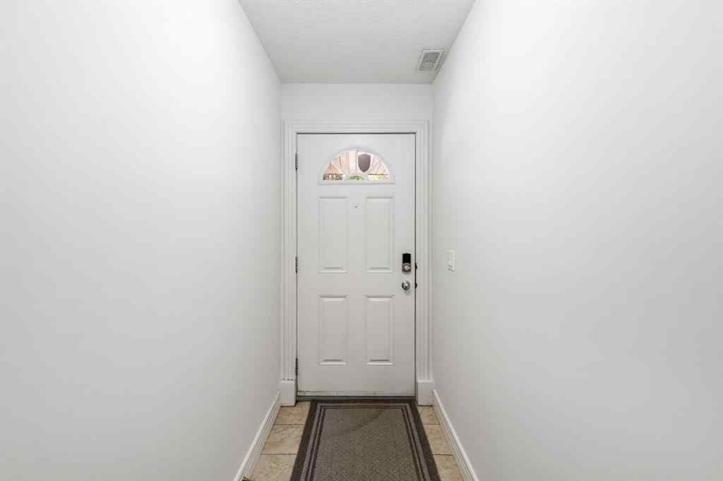 MLS® A2268462 - Unit #7 156 Rockyledge View NW in Rocky Ridge Calgary, Residential